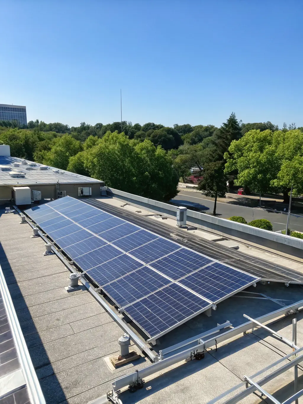 Solar panels installed on a rooftop, illustrating Tunc GmbH's commitment to energy efficiency and sustainable solutions.